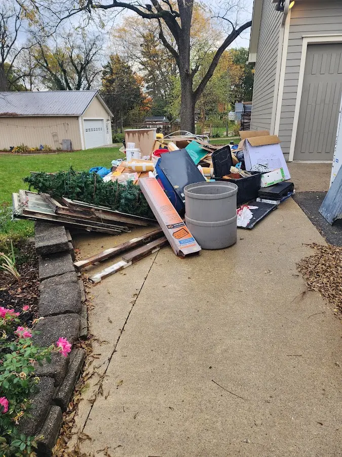 Dumpster being loaded with debris for Commercial Dumpster Rental in Lakeside